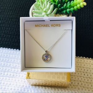 Michael Kors Silver Tone Logo Pave Dics Pendant